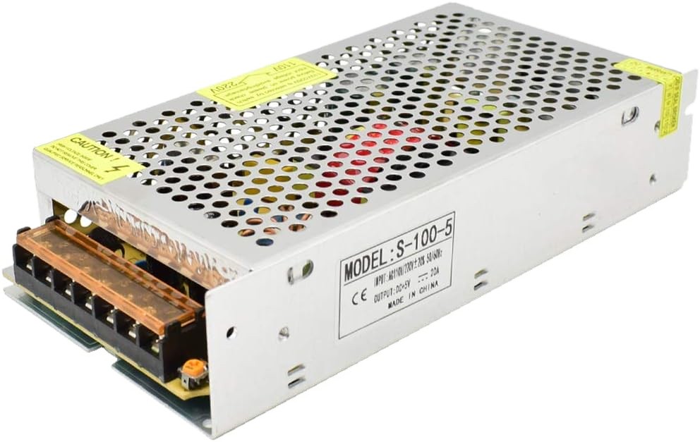 The power supply used in the tutorial. A large metal cuboid with several screw terminals at the rear (for mains input and 5V outputs) all surrounded by perforated aluminium for passive air cooling